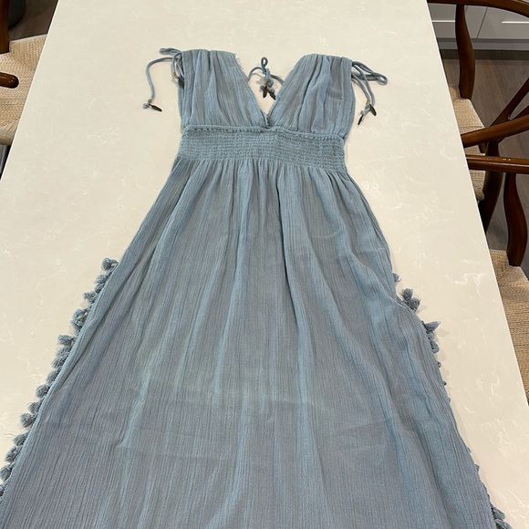 Z&L Dresses & Skirts - Adorable light blue gauze dress with feather charm detail size medium
